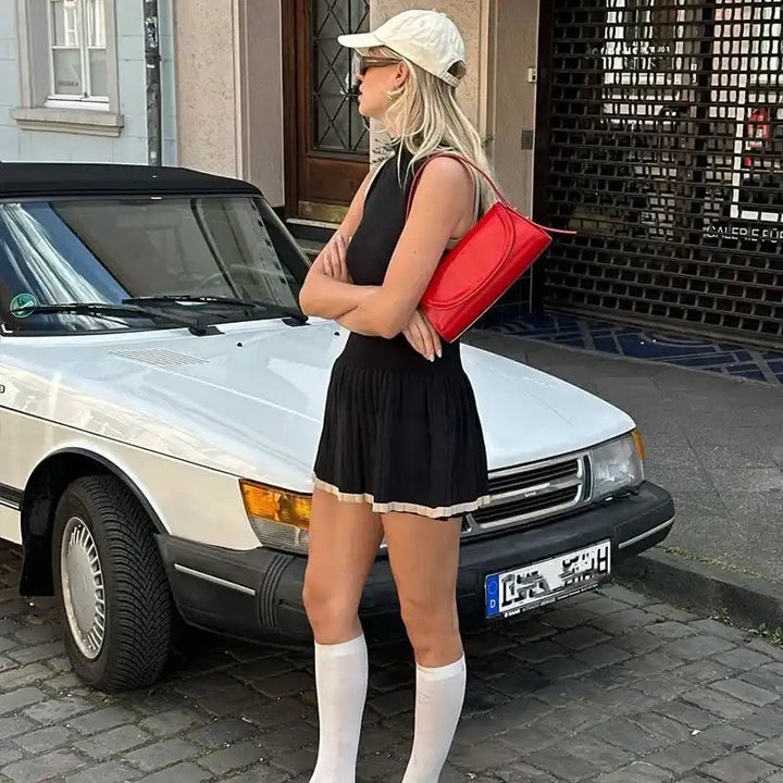 Damska bezrękawnikowa dzianinowa sukienka mini w nowoczesnej elegancji