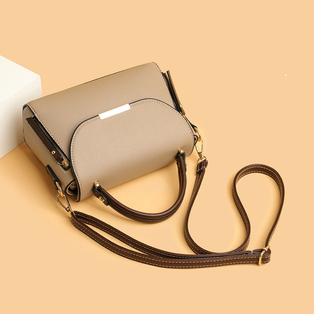 Kobieta strukturalna torebka crossbody z kontrastowym paskiem